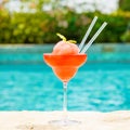 Frozen strawberry margarita cocktail at the edge of a resort poo Royalty Free Stock Photo