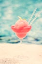 Frozen strawberry margarita cocktail at the edge of a resort poo Royalty Free Stock Photo