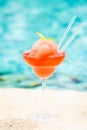 Frozen strawberry margarita cocktail at the edge of a resort poo Royalty Free Stock Photo