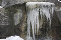 Frozen stream crating icicles Royalty Free Stock Photo