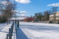 Frozen stream Tegeler Fliess with its heritage-protected Haven bridge in Berlin, Germany