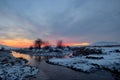 Frozen sunset over river Royalty Free Stock Photo