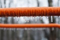 Frozen swing with icicles, playground, horizontal bars Royalty Free Stock Photo