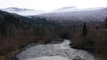 Frozen Valldola river on Trollstigen route in snow in Norway Royalty Free Stock Photo