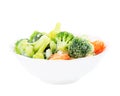 Frozen vegetables in ceramic bowl isolated on white Royalty Free Stock Photo