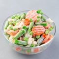 Frozen vegetables in glass bowl, square format, closeup Royalty Free Stock Photo