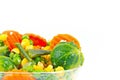 Frozen vegetables in a glass bowl on a white background Royalty Free Stock Photo