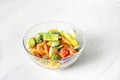 Frozen vegetables in a glass plate on a white background. The concept of healthy eating Royalty Free Stock Photo