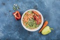 Frozen vegetables: Mexican mixed vegetables in a large white plate on a blue background Royalty Free Stock Photo