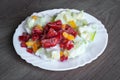 Frozen vegetables on a white plate - bell peppers, zucchini. Healthy food concept Royalty Free Stock Photo