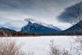Frozen Vermillion Lake with Mount Rundle and snow covered in winter on sunny day at Banff national park Royalty Free Stock Photo
