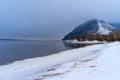 Frozen Volga River coast, winter landscape with snow and mountains Royalty Free Stock Photo