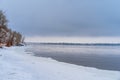 Frozen Volga River coast, winter landscape with snow and mountains Royalty Free Stock Photo