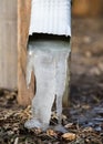 Frozen water in the drain spout Royalty Free Stock Photo