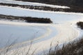 Frozen water, patterns of snow in small lakes. Royalty Free Stock Photo