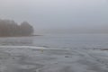 Frozen water surface of the dam in the fog Royalty Free Stock Photo