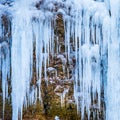 Frozen waterfall of blue icicles Royalty Free Stock Photo