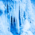 Frozen waterfall of blue icicles Royalty Free Stock Photo