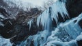 Frozen Waterfall Cascading Down a Rocky Cliff in Winter Royalty Free Stock Photo