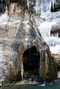 Frozen waterfall and rock-ice grotto