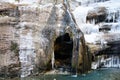 Frozen waterfall and rock-ice grotto