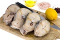 Frozen white fish steaks, cooking ingredients Royalty Free Stock Photo