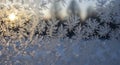 Frozen window with ice crystals shining Royalty Free Stock Photo