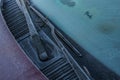 Frozen windscreen and windshield wipers totally covered with ice, caution, poor view causes dangerous driving Royalty Free Stock Photo