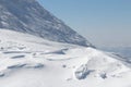 Frozen windswept snow and ice extreme cold mountain landscape Royalty Free Stock Photo