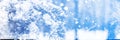 Frozen winter background. Blue ice winter background with tree branch, texture blue wallpaper Royalty Free Stock Photo