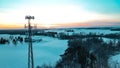 Frozen winter landscape with radar tower