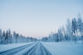 Frozen winter road in Finland Royalty Free Stock Photo