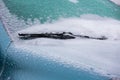 Frozen wiper of the car with icicles Royalty Free Stock Photo