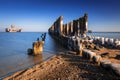 Frozen wooden breakwaters line at Baltic Sea