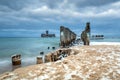 Frozen wooden breakwaters line to the world war II torpedo platform at Baltic Sea