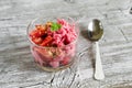 Frozen yogurt with strawberries and cookie crumbs in a glass bowl Royalty Free Stock Photo