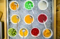 Frozen yogurt toppings bar. Yogurt toppings ranging from fresh fruits Royalty Free Stock Photo