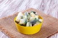 Frozen zucchini cubes in a plate