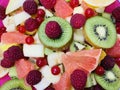 Fruit background photo.Fruit salad close-up. Variety of colorful fruits. Fruit platter.