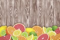 Fruit background with slices of orange, grapefruit, lemon and lime on wooden desk.