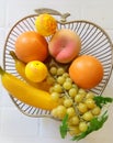 Fruit basket banana grapes oranges