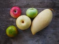 Apple and orange Fruit basket.organic healthy fruit on wood table