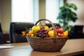 a fruit basket on an office desk Royalty Free Stock Photo