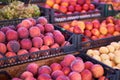 Fruit bazaar peaches grapes apricots ripe juicy lie plastic box showcase Royalty Free Stock Photo