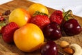 Fruit and berries on a cutting board proper food preparation home cooking foodphoto Royalty Free Stock Photo