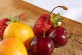 Fruit and berries on a cutting board proper food preparation home cooking foodphoto