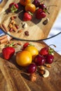 Fruit and berries on a cutting board proper food preparation home cooking foodphoto Royalty Free Stock Photo