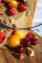 Fruit and berries on a cutting board proper food preparation home cooking foodphoto