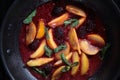 Fruit and berries flamb in a frying pan. Close up .Top view Royalty Free Stock Photo