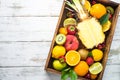 Fruit and berries in wooden tray top view.. Royalty Free Stock Photo